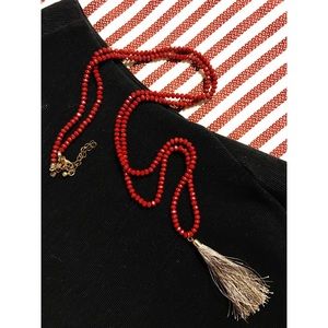 Gray / sliver tassel necklace with red beads